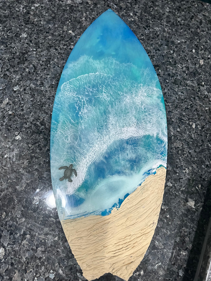 Surfboard with turtle accent